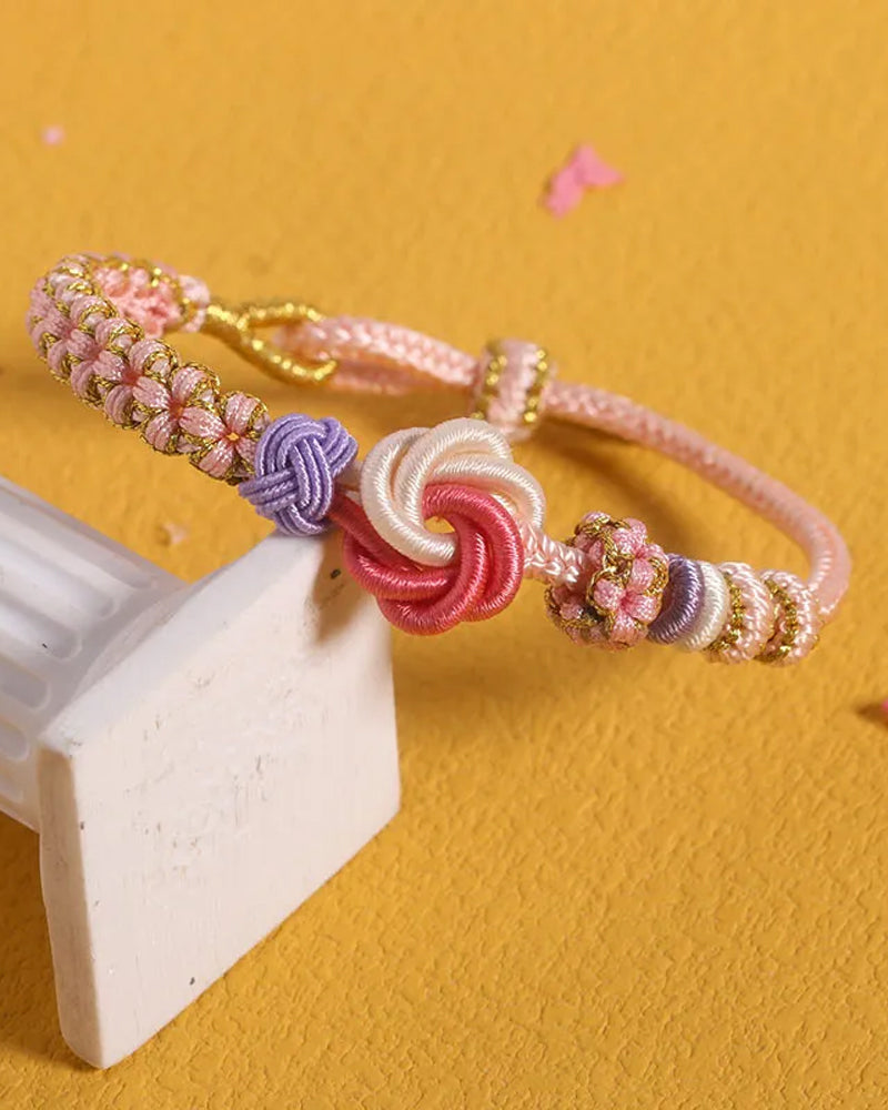 Bracelet with knot of peach blossoms